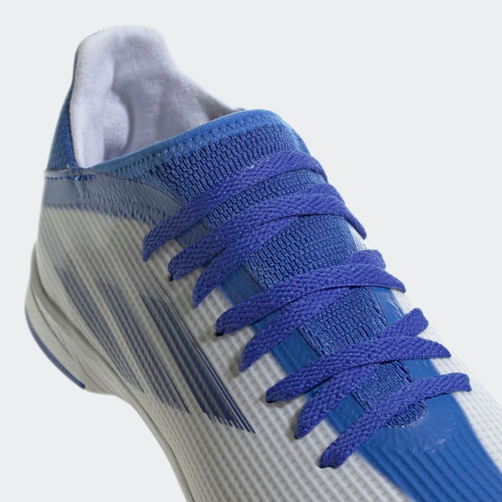 Zapatos de fútbol adidas X Speed ​​Flow.3 TF J para niños, color blanco y azul