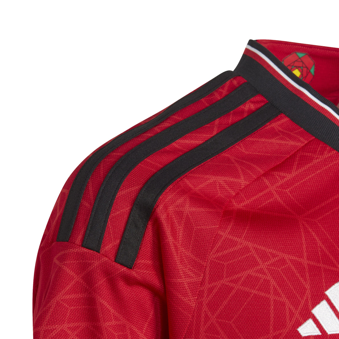 Camiseta adidas de local del Manchester United para niños 23