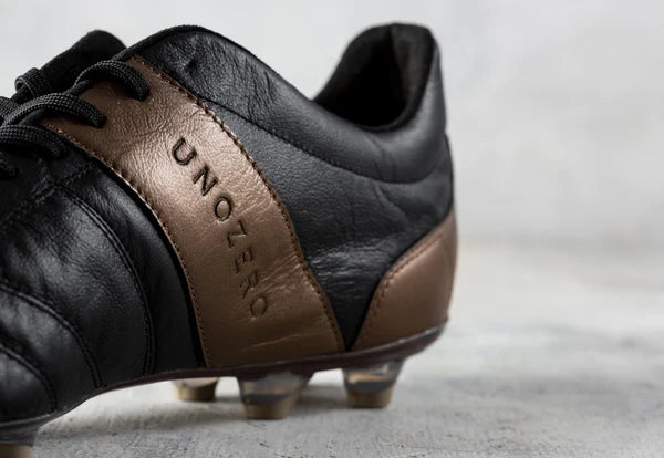 Botas de fútbol para superficies firmes Unozero FG Modelo 1.0 Negro